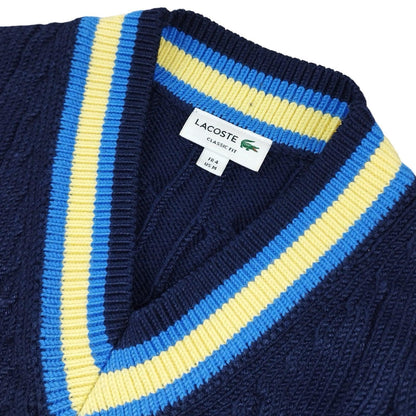 Lacoste - Pull torsadé à col V bleu marine taille S - Le Saptuaire