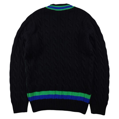 Lacoste - Pull torsadé à col V en laine noir taille M - Le Saptuaire