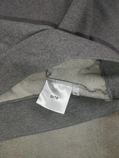 Pull à capuche gris taille L - Le Saptuaire