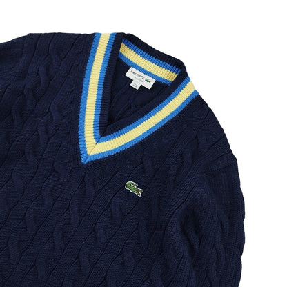 Lacoste - Pull torsadé à col V bleu marine taille S - Le Saptuaire