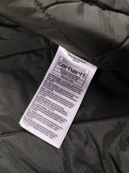 Carhartt - Veste matelassée kaki taille L - Le Saptuaire