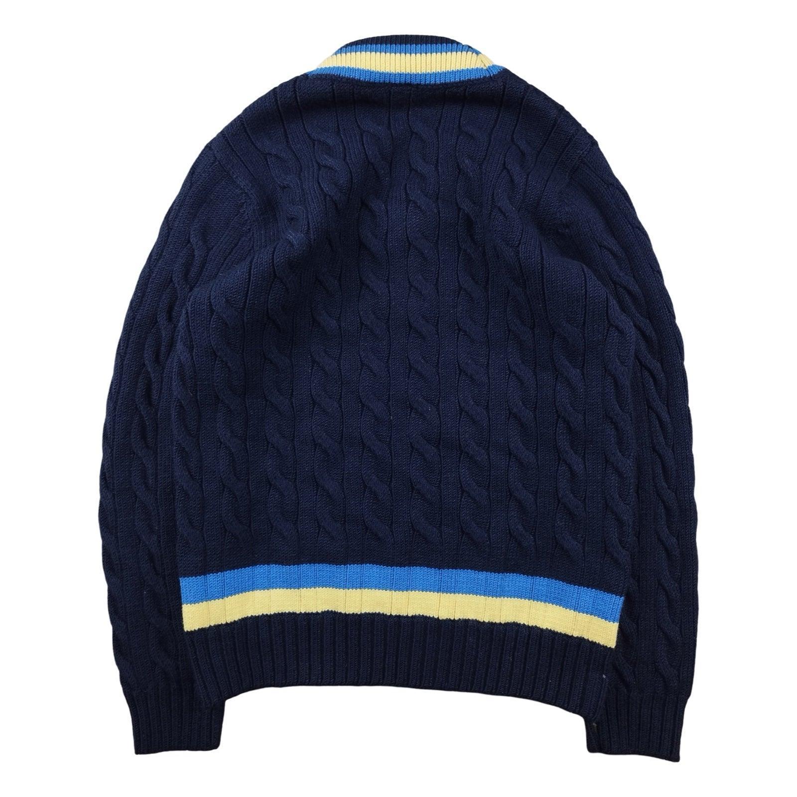 Lacoste - Pull torsadé à col V bleu marine taille S - Le Saptuaire