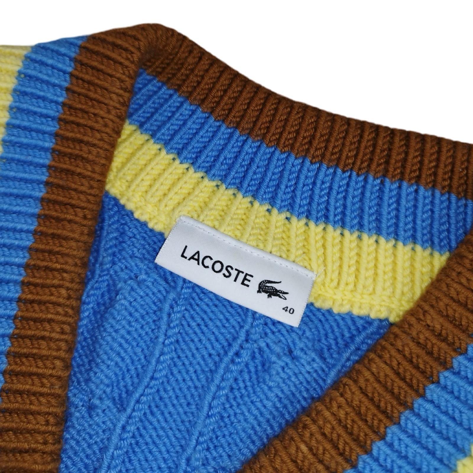 Lacoste - Pull torsadé à col V bleu taille M - Le Saptuaire