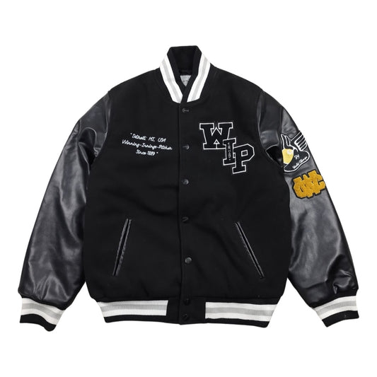 Carhartt - Varsity Jacket matelassée noire taille M - Le Saptuaire